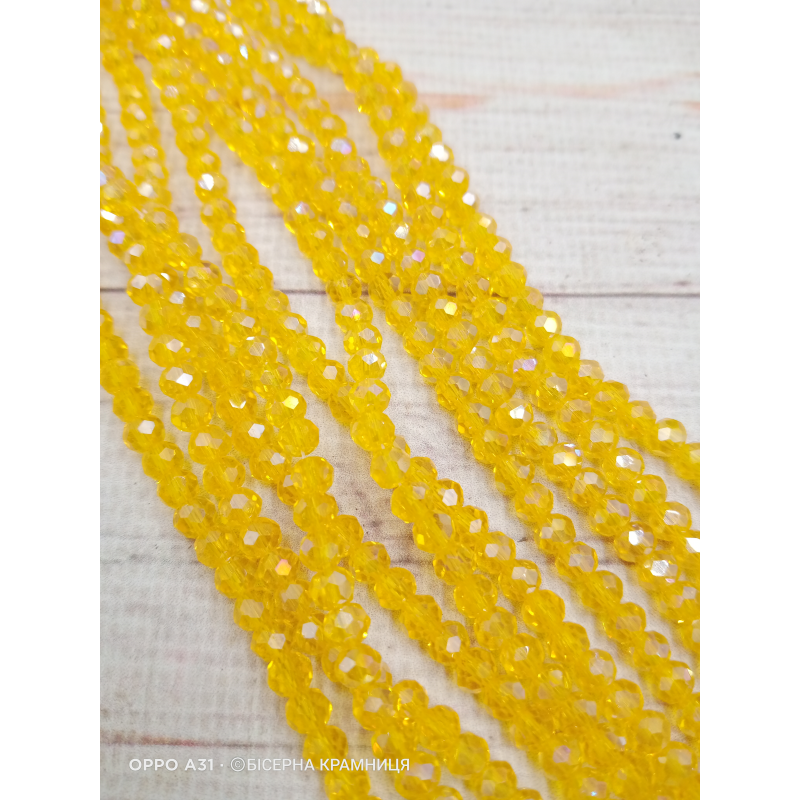 Ронделі, розмір 4*3 мм. Темно-жовті прозорі з райдужним покриттям