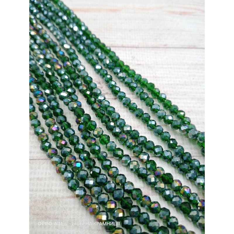 Ронделі, розмір 4*3 мм. Темно-зелені прозорі з райдужним покриттям