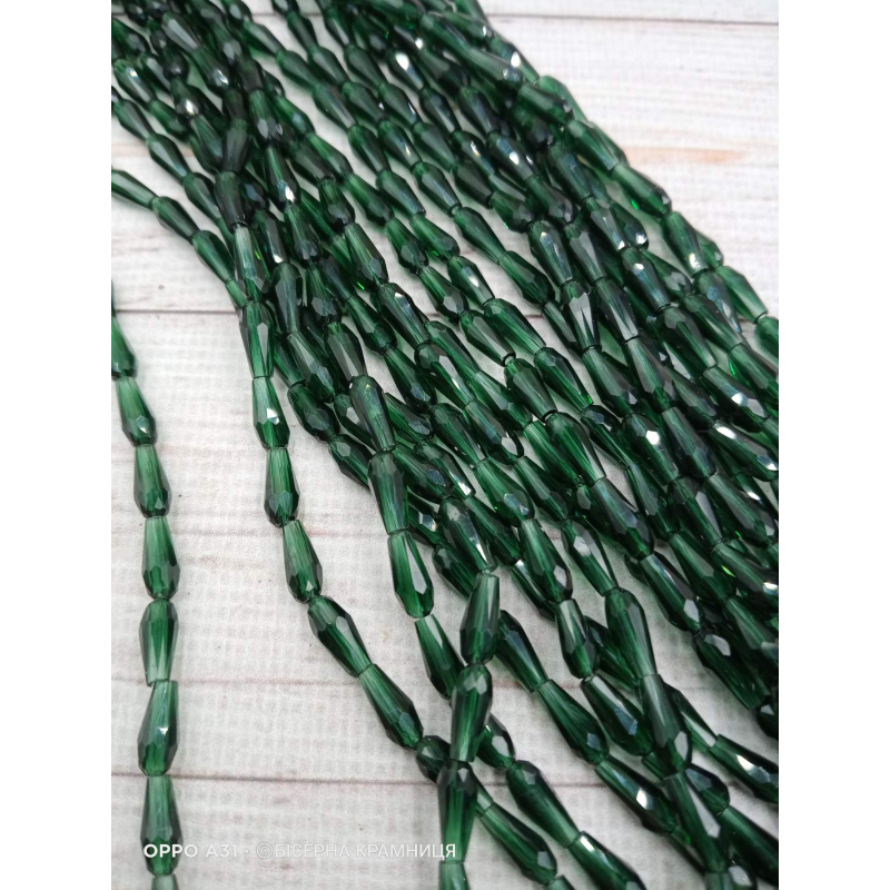 Намистини-краплі, розмір 9*4 мм. Темно-зелені прозорі Намистини-краплі, розмір 9*4 мм. Темно-зелені прозорі