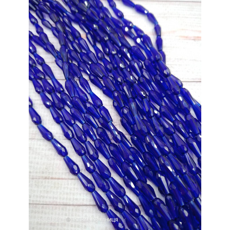 Намистини-краплі, розмір 9*4 мм. Темно-сині прозорі