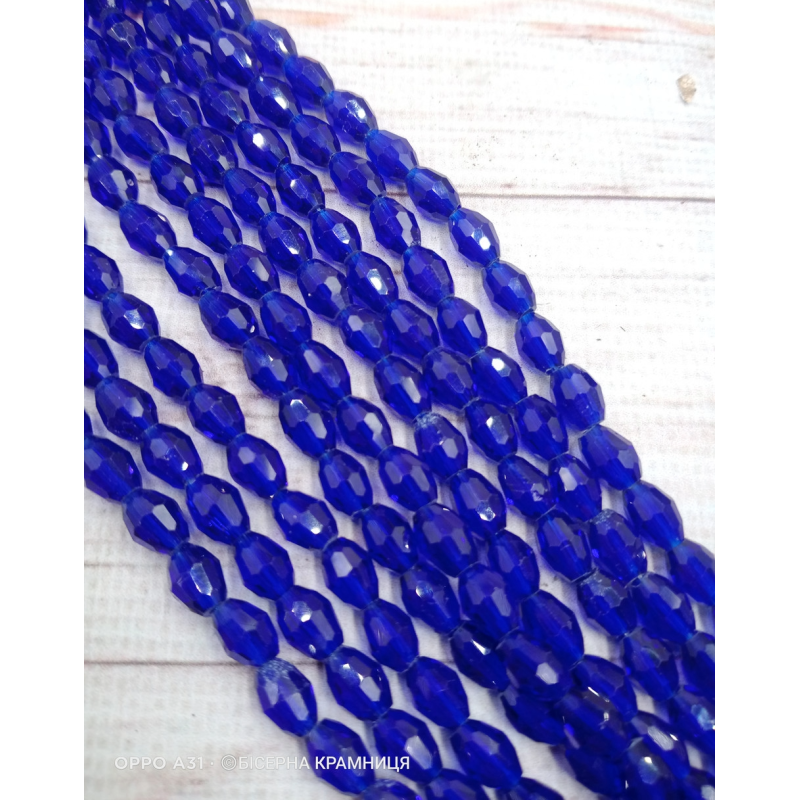 Намистини-овал, 8*6 мм. Сині прозорі