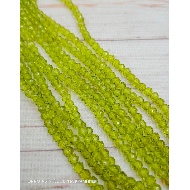 Рондель, розмір 4х3 мм. Оливкові прозорі