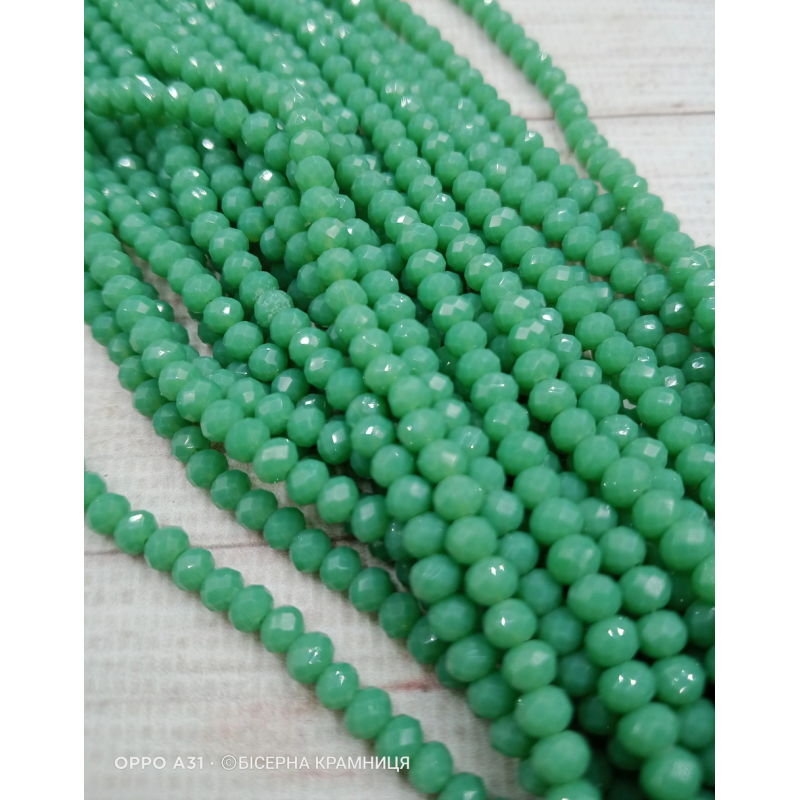 Рондель, розмір 4х3 мм. Зелений трав'яний світлий непрозорий