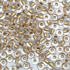 68106 бісер №10 Preciosa (Чехія) 5 грамів. Прозорий з бронзовой серединкою