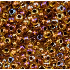 19029 бісер №10 Preciosa (Чехія) 5 грамів. Прозорий райдужний із мідною серединкою