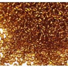 19050 бісер №10 Preciosa (Чехія) 5 грамів. Прозорий із мідною серединкою