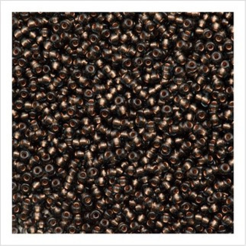 49010 бісер №10 Preciosa (Чехія) 5 грамів. Прозорий з мідною серединкою