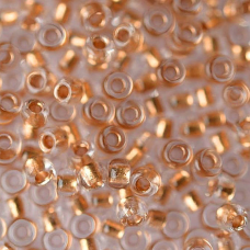 68105 бісер №10 Preciosa (Чехія) 5 грамів. Прозорий з мідною серединкою