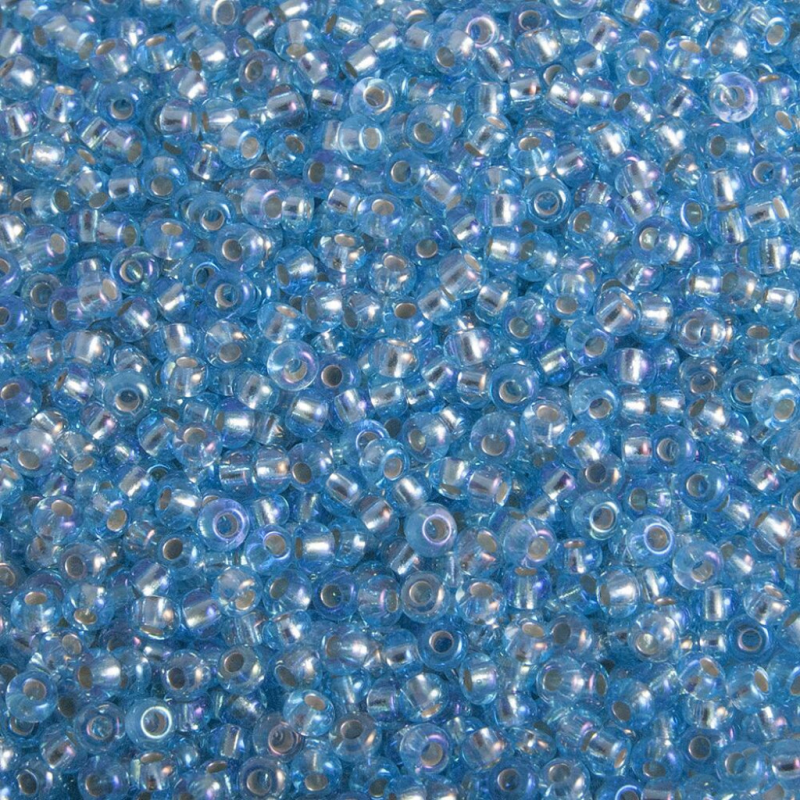 67019 бісер №10 Preciosa (Чехія) 5 грамів. Блискучий райдужний із срібною серединкою 67019 бісер №10 Preciosa (Чехія) 5 грамів. Блискучий райдужний із срібною серединкою