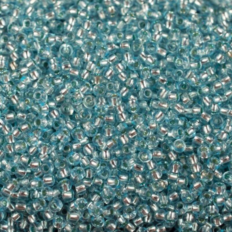 78234 бісер №10 Preciosa (Чехія) 5 грамів. Блискучий з срібною серединкою 78234 бісер №10 Preciosa (Чехія) 5 грамів. Блискучий з срібною серединкою