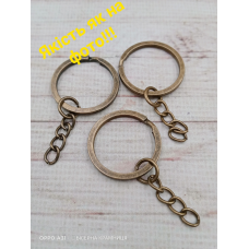 Основа для брелока кольору бронзи, діаметр кільця 25 мм.