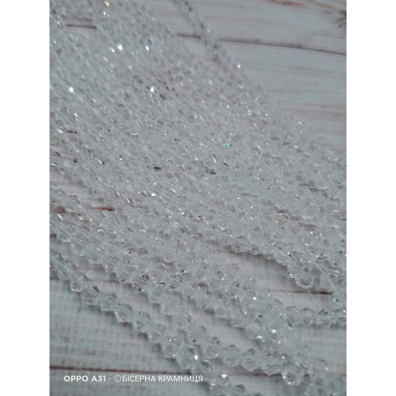 Біконус, розмір 4*4 мм. Прозорий