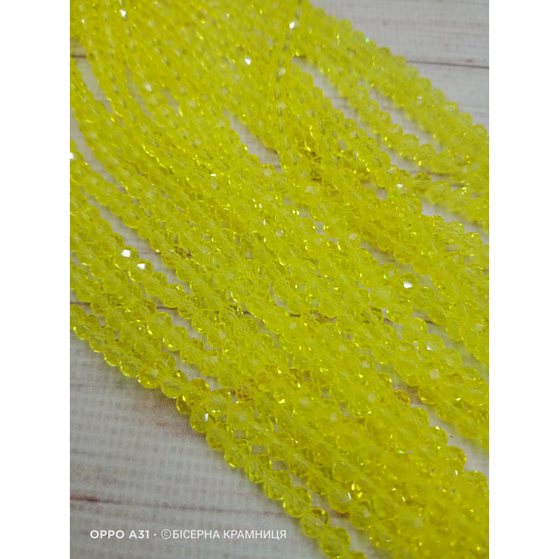 Ронделі, розмір 4*3 мм. Лімонний прозорий Ронделі, розмір 4*3 мм. Лімонний прозорий