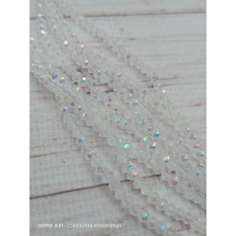 Ронделі, розмір  3*2 мм. Прозорі з райдужним напиленням