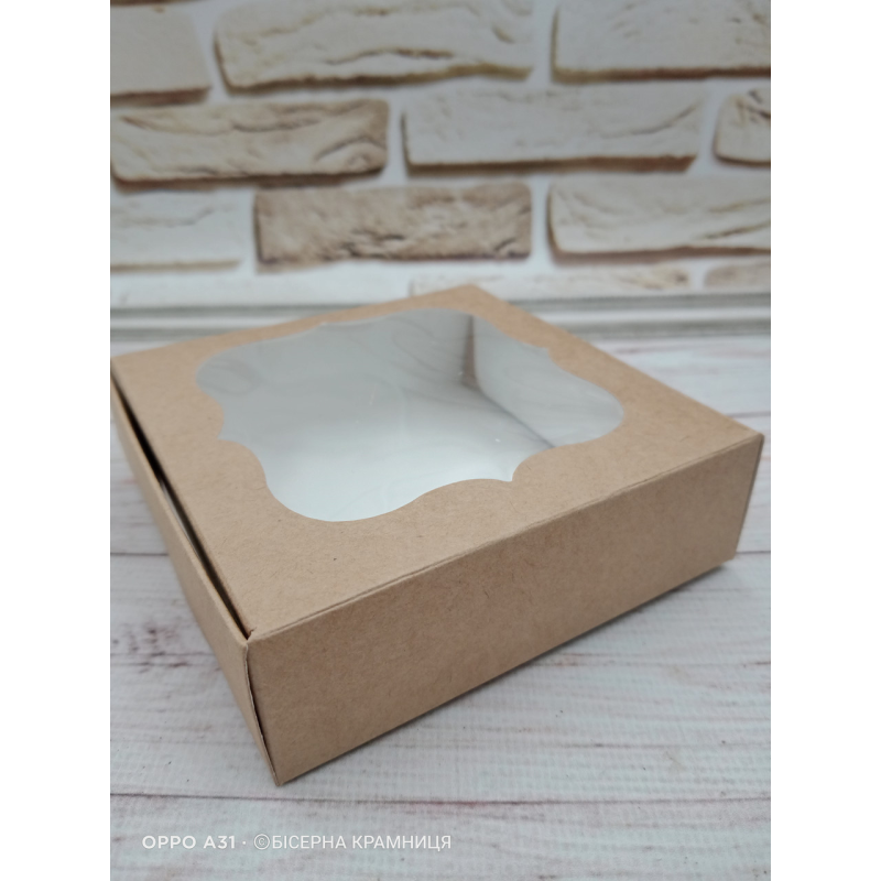 Самозбірна крафтова коробочка з віконцем, розмір 100*100*30 мм Самозбірна крафтова коробочка з віконцем, розмір 100*100*30 мм