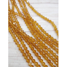 Біконус, розмір 4*4 мм. Світло-коричневі прозорі