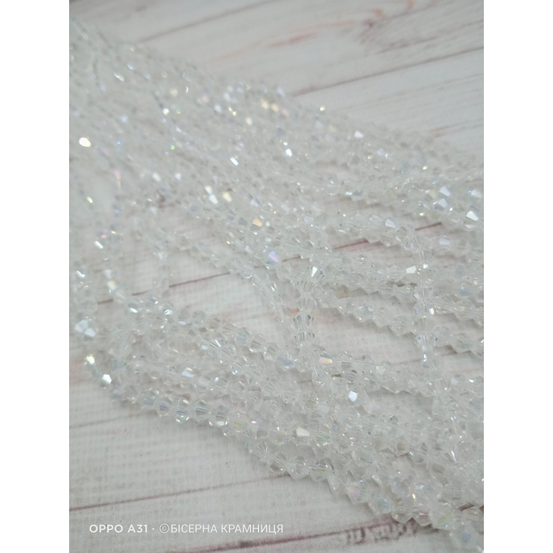 Біконус, розмір 4*4 мм. Прозорий із райдужним покриттям