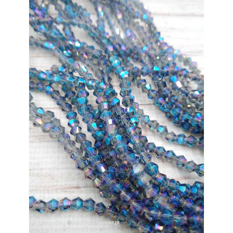 Біконус, розмір 4*4 мм. Прозорий сірий із райдужним напиленням