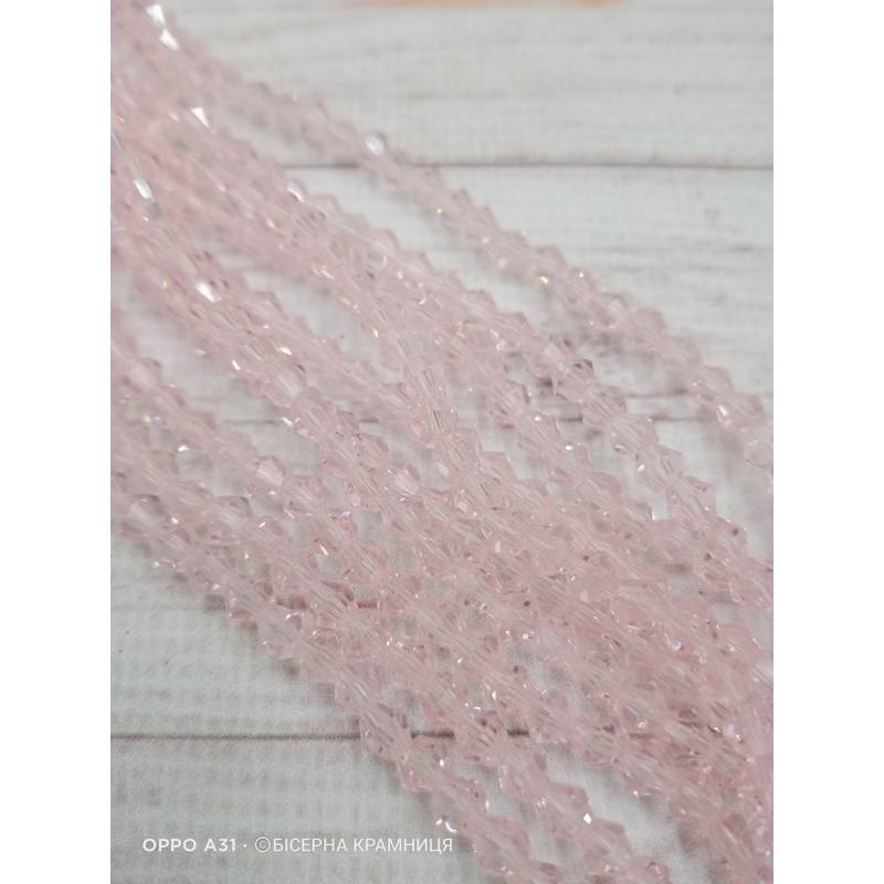 Біконус, розмір 4*4 мм. Прозорий ніжно-рожевий