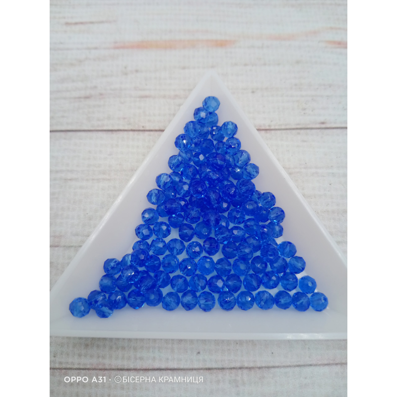 Ронделі, розмір 4*3 мм. Прозорі темно-блакитні