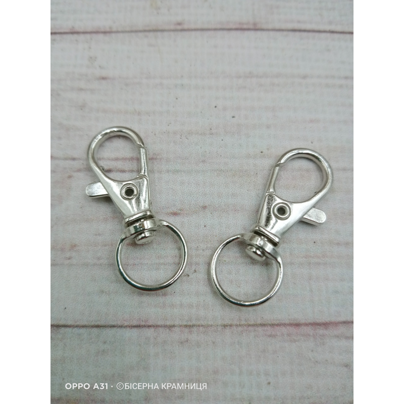 Карабін для сумки, брелока, колір срібла. 31*12 мм. Ціна за штуку