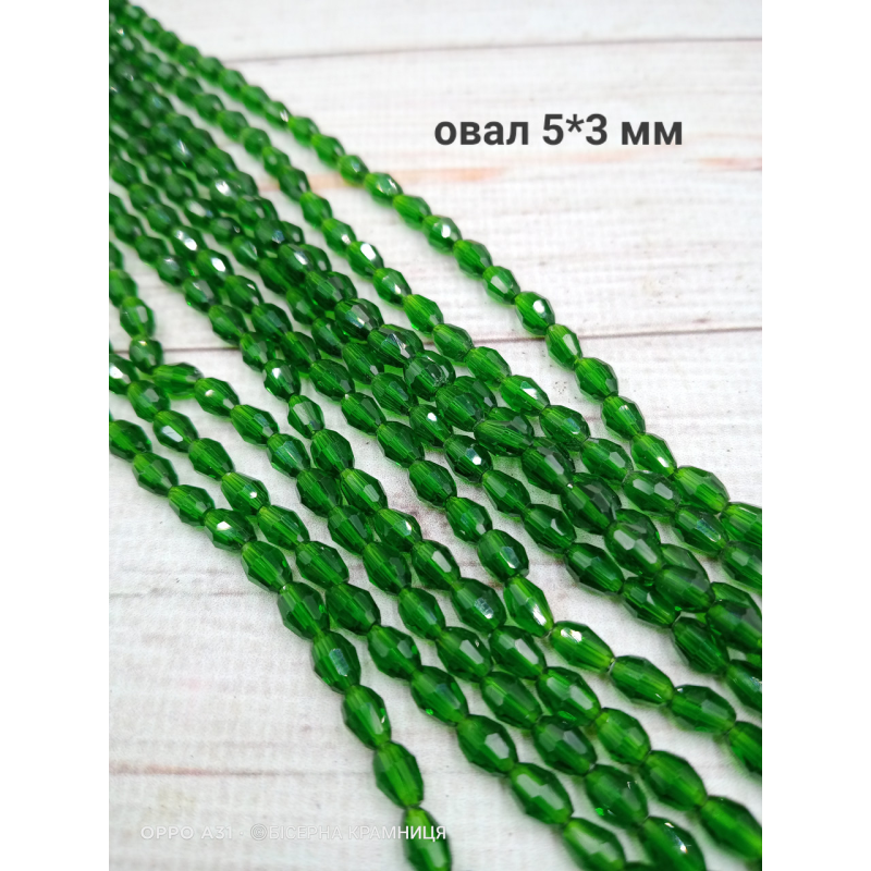 Намистини-овал, 5*3 мм. Зелені прозорі
