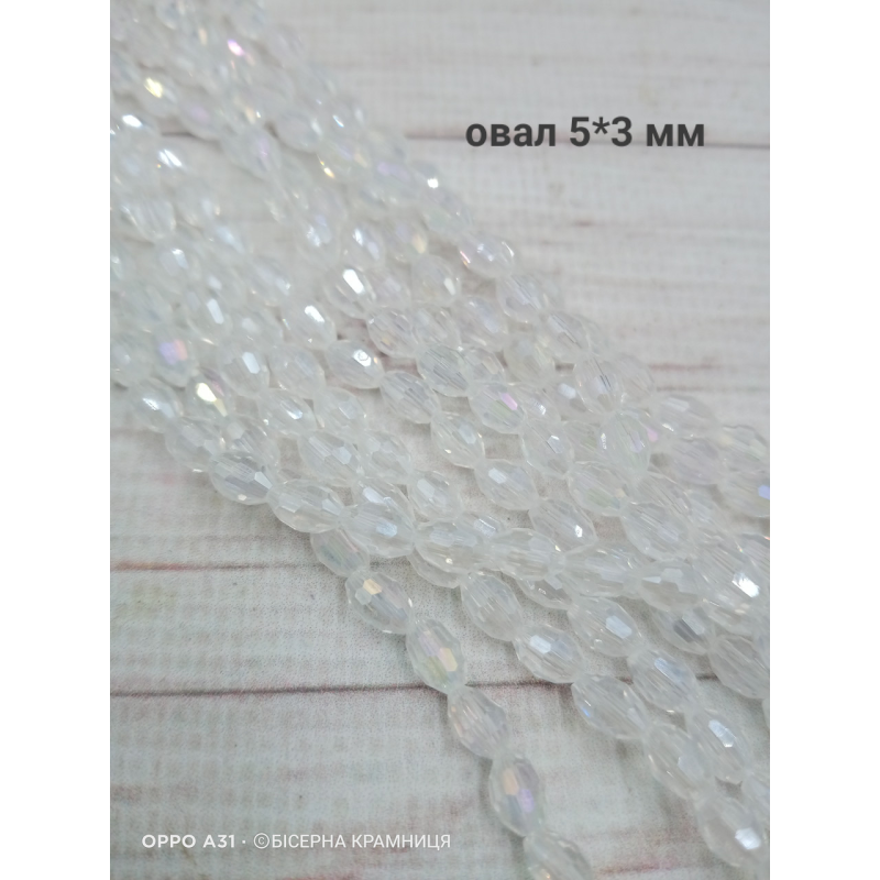 Намистини-овал, 5*3 мм. Прозорі з райдужним покриттям