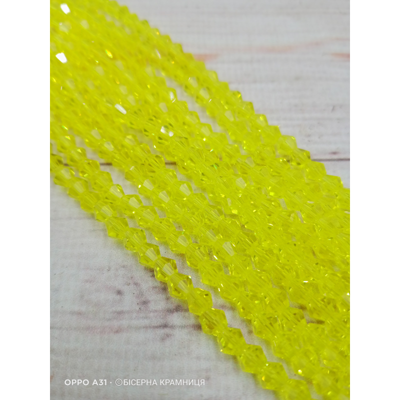 Біконус, розмір 4*4 мм. Лимонний прозорий