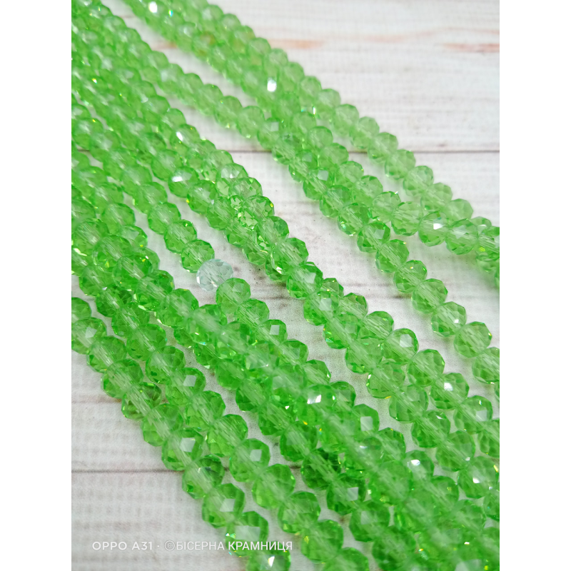 Ронделі, розмір 6*4 мм. Салатові прозорі Ронделі, розмір 6*4 мм. Салатові прозорі