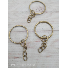 Основа для брелока бронзового кольору, діаметр кільця 25 мм.