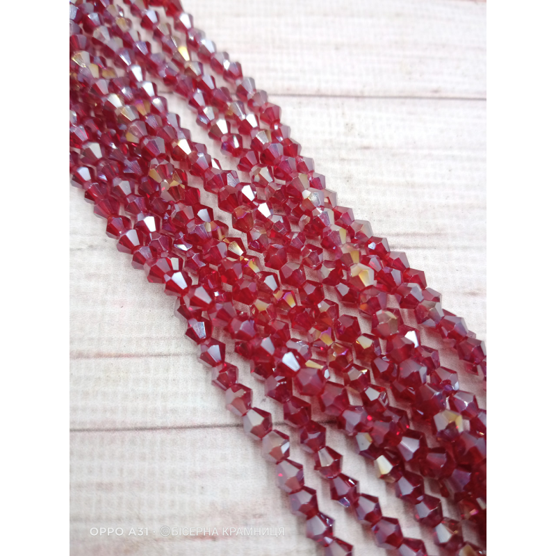 Біконус, розмір 4*4 мм. Прозорий бордовий з райдужним покриттям