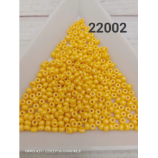 22002-10/0 Бісер Чехія (перламутровий непрозорий, жовтий темний), упаковка 50 грамів