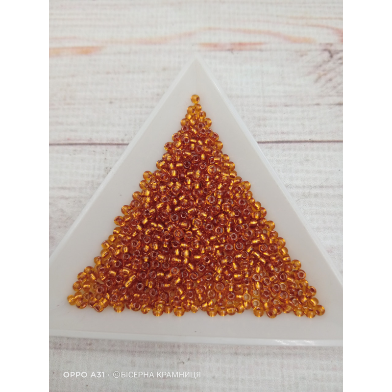 19070 бісер №10 Preciosa (Чехія) 5 грамів. Прозорий із мідною серединкою