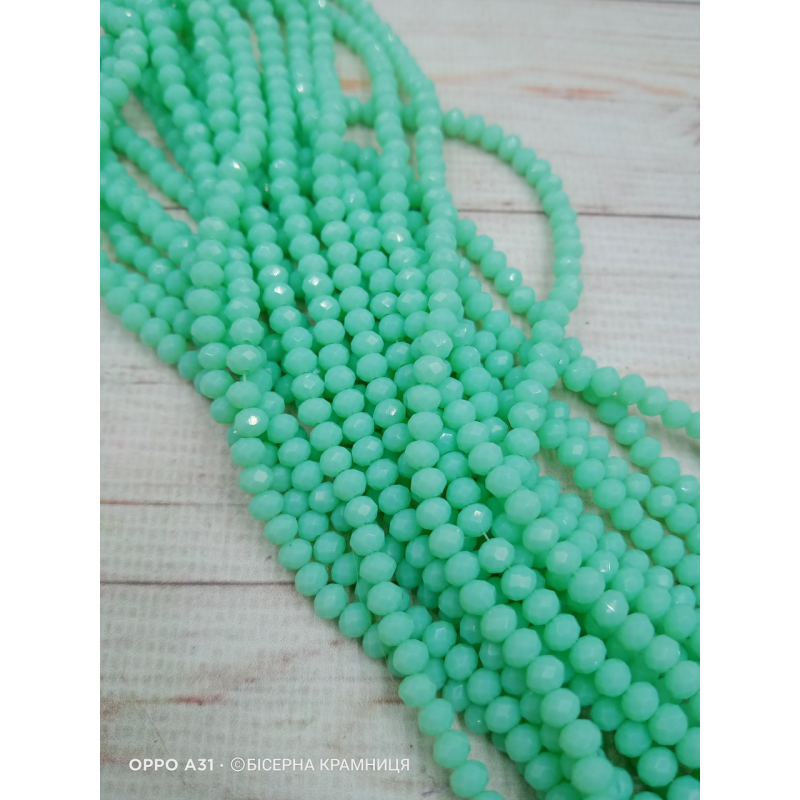 Ронделі, розмір 4*3 мм. Світла зелена м“ята непрозорі Ронделі, розмір 4*3 мм. Світла зелена м“ята непрозорі