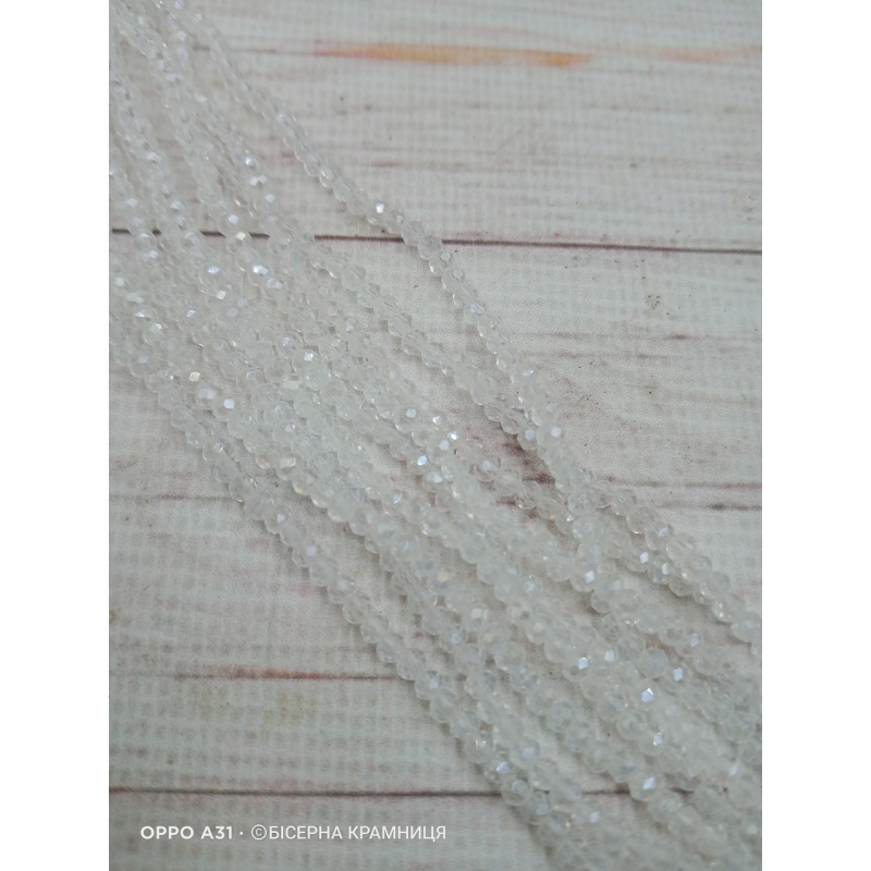 Ронделі, розмір 3,2*2,5 мм. Прозорі з райдужним покриттям