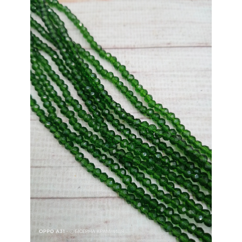 Ронделі, розмір 3,2*2,5 мм. Темно-зелені прозорі
