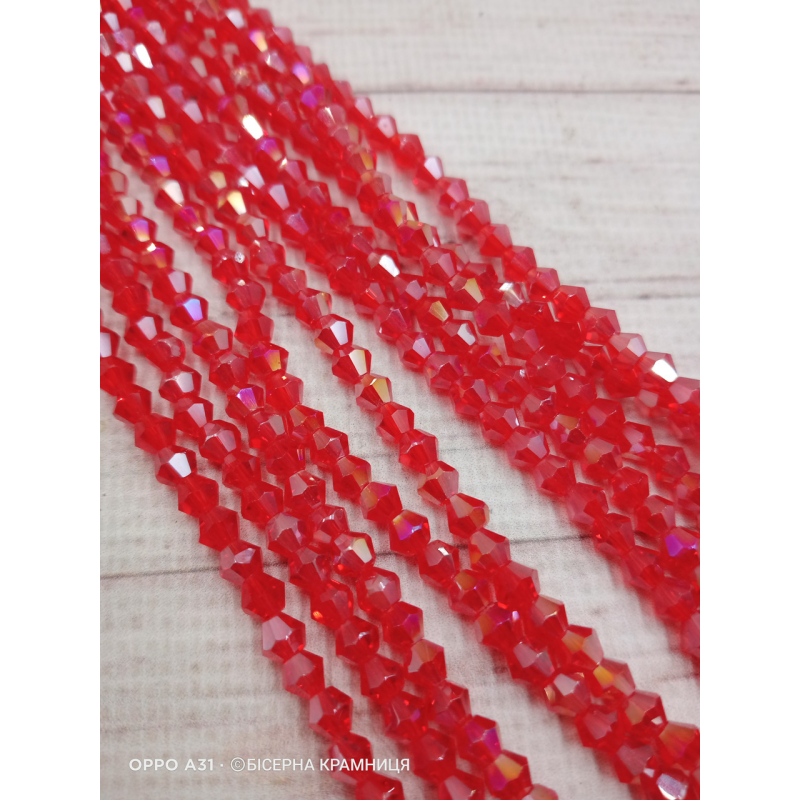 Біконус, розмір 4*4 мм. Світлий червоний прозорий з перламутровим напиленням