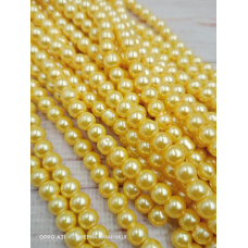 Майорка 6 мм, круглі намистини, скло. Колір жовто-молочний