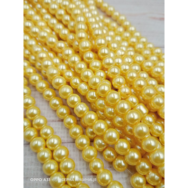 Майорка 6 мм, круглі намистини, скло. Колір жовто-молочний Майорка 6 мм, круглі намистини, скло. Колір жовто-молочний