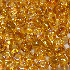 743-10/0-11050 Бісер Чехія (прозорий райдужний, бурштиновий), упаковка 50 грамів