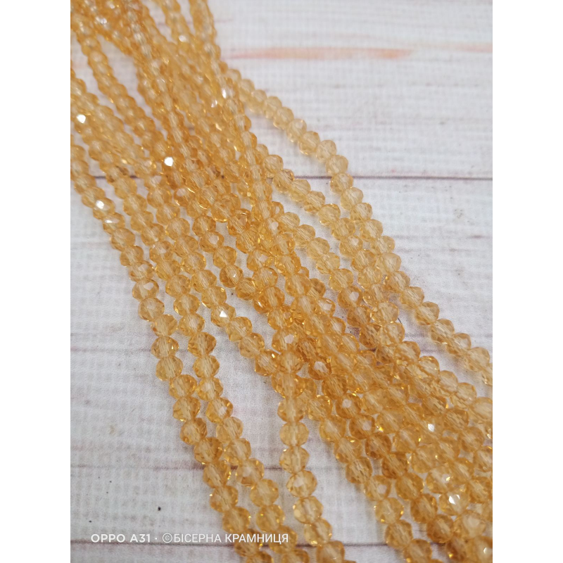 Ронделі, розмір 4*3 мм. Світло-коричневі прозорі